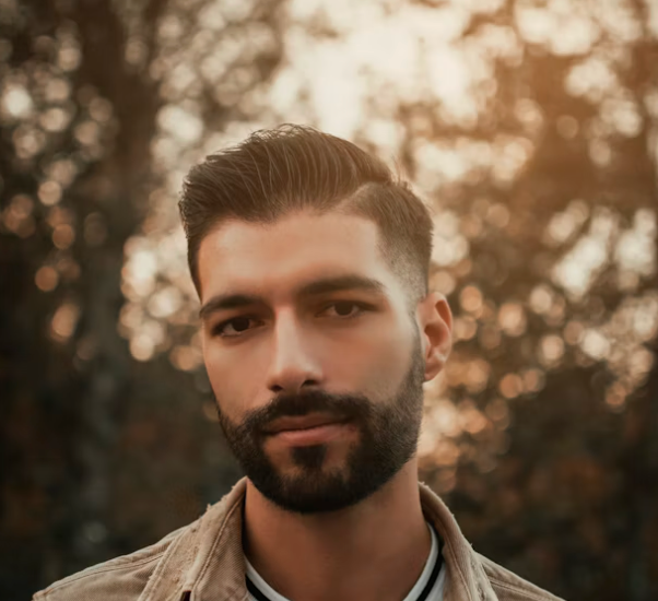 Bearded man outdoor portrait.